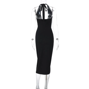 Detail of the back tie design on a sleek backless bodycon halter dress in black