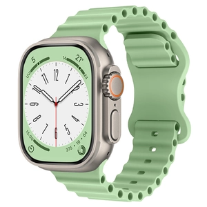 Detail of light green wavy silicone ocean strap with adjustable holes for smart watch