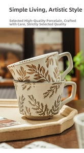 Macro detail of hand-painted floral pattern and textured finish on ceramic coffee mugs