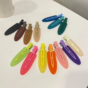 Detailed collection of colorful matte hair clips in various macaron shades and dark tones