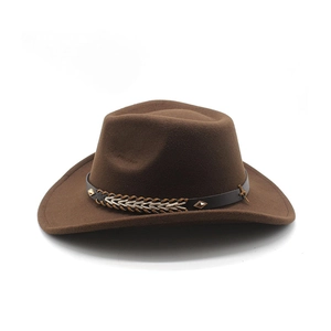 Detailed view of brown wool felt cowboy hat with leather band and metal studs