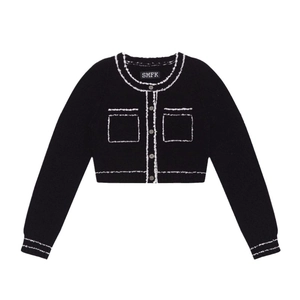 Women's black knit cardigan with white fringe trim and contrast buttons in a cropped fit