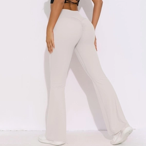 Detail view of high waist yoga pants featuring scrunch butt lifting design in light grey