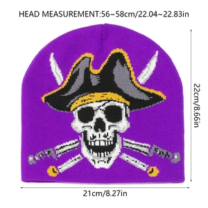 Close-up of purple knit beanie with pirate skull embroidery and dimensions chart