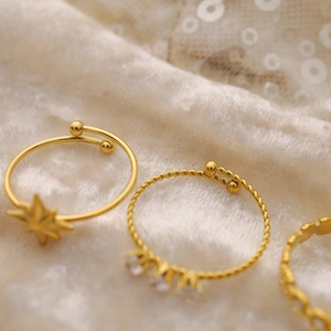 Adjustable gold stainless steel ring set with star and zircon detailing for women