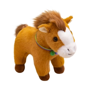 Cute brown plush pony doll with fluffy mane and purple bell collar on white background