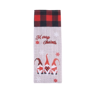 Christmas gnome wine bottle cover with red buffalo plaid and Merry Christmas greeting