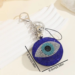 Close-up of 6.5cm Evil Eye keychain with blue rhinestones and tassel detail