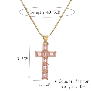Detailed view of 3.5x1.8cm cross pendant with pink zircons and box chain dimensions