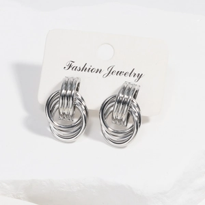 Detail of silver multi-loop hoop earrings on Fashion Jewelry display card