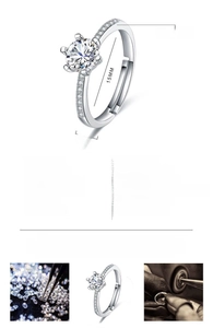 Detailed view of the six-prong heart ring showing German polishing craft and specifications