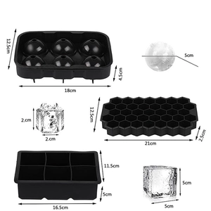 Black silicone ice cube mold set with sphere, honeycomb, and large square shapes