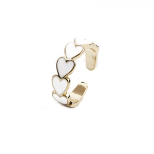 Adjustable gold plated open ring featuring five white enamel hearts in a row