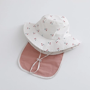 Detail of kids sun hat with cherry print, neck protection flap and adjustable chin strap