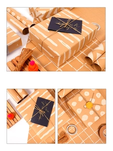 Close-up of brown kraft wrapping paper with white dots, stripes and twine ribbon details