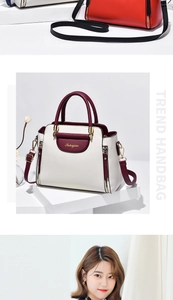 Detail view of the Pahajim handbag showing color-block PU leather and gold zipper accents