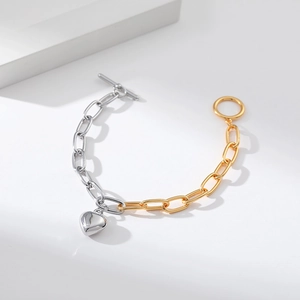 Two-tone mixed metal chain bracelet with heart charm and T-bar toggle clasp for women