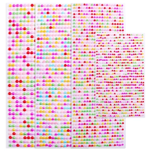 Detailed view of colorful DIY pearl adhesive stickers in various sizes on white backdrop