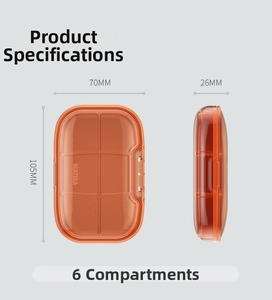 Detail view of 6-compartment orange medicine box with 105mm x 70mm x 26mm dimensions