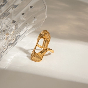 Artistic gold chunky open ring with organic molten texture and hammered finish