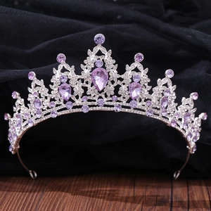 Close-up of sparkling purple crystals and small diamonds set in silver metal crown