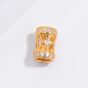 S925 silver cylinder bead with gold plating and cubic zirconia rhombic pattern on white
