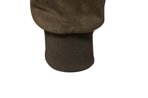 Detail of dark brown fleece jacket showing ribbed knit elastic cuffs for winter warmth