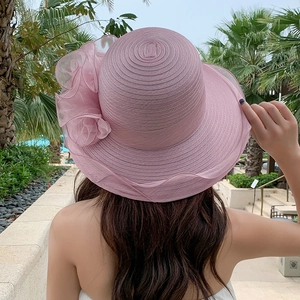 Pink wide-brim organza sun hat for women with 3D floral accent and wavy edge detail