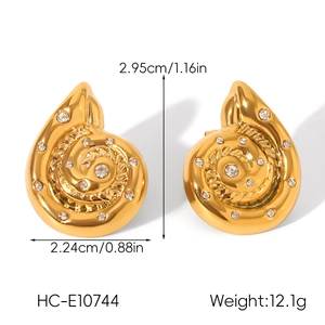 Detail view of 18K gold plated shell earrings with rhinestones and size measurements