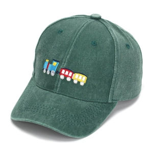 Close-up of the detailed colorful cartoon train embroidery on a dark green cotton baseball cap