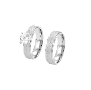 Titanium steel couple rings with frosted finish and a sparkling cubic zirconia stone.