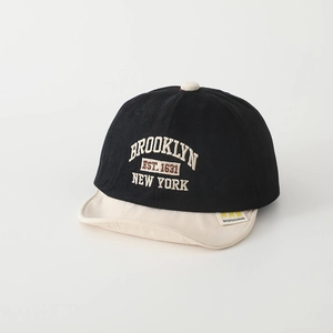Detail of Brooklyn embroidery and contrast soft brim on baby baseball cap