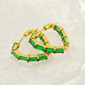 Gold heart hoop earrings with emerald-cut green zircons in a vintage luxury style