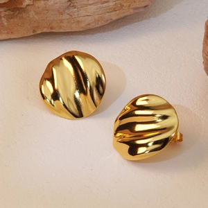 Modern gold plated stainless steel earrings featuring artistic textured ripple design