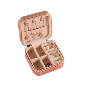 Portable rose gold laser jewelry box with mirror and velvet interior compartments