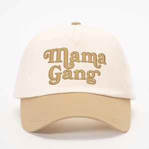Close-up of Mama Gang embroidery on a two-tone cotton baseball cap with khaki brim
