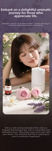 Detail of 10ml rose essential oil bottle with a white ultrasonic aroma diffuser for spa