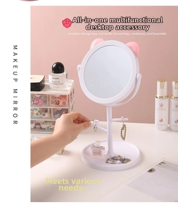 White cat-ear makeup mirror with jewelry tree hooks and LED touch screen light