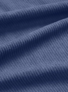 Detailed macro view showing the soft texture of blue corduroy fabric for men's sweatshirts