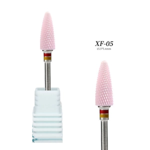 Macro detail of XF-05 pink ceramic nail drill bit with fine cross-cut flute textures