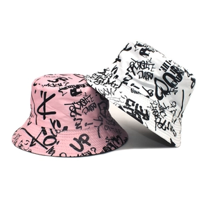 Graffiti print bucket hat set in pink and white styles with street art letter patterns