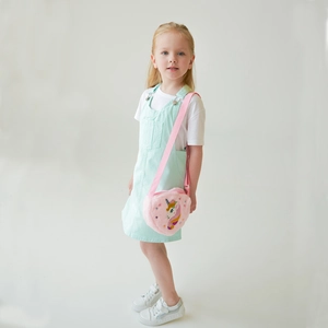 Detailed view of kids plush pink crossbody bag with colorful unicorn embroidery detail