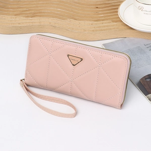 Pink PU leather long wallet with wristlet and triangle emblem on elegant still life setting