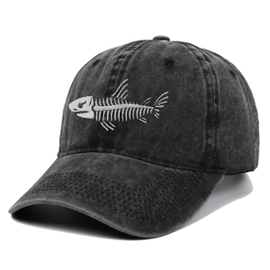Detailed close-up of fishbone embroidery on washed cotton charcoal baseball cap