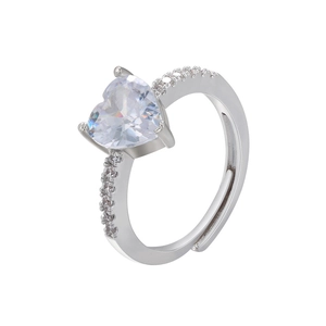 Detail of heart-cut clear zircon ring with micro-paved crystals and silver adjustable band