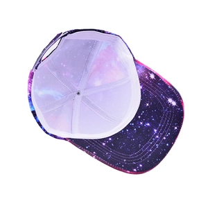 Detail of starry sky tie-dye baseball cap featuring white inner sweatband and stitching