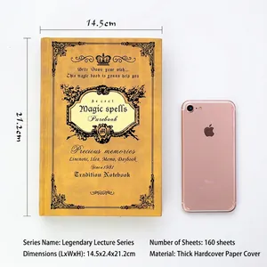 Vintage magic book style notebook with embossed yellow hardcover and crown patterns
