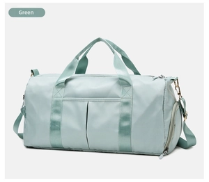 Detail of green travel bag showing waterproof fabric and separate side shoe compartment