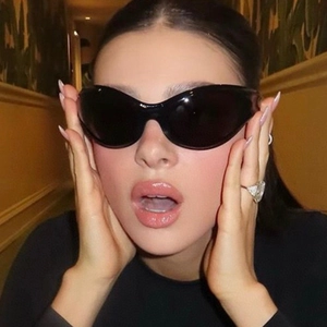 Y2K sporty wrap-around black sunglasses for women with futuristic punk cat-eye design