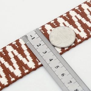 Ethnic wide adjustable bag strap with brown and white woven pattern and 3.8cm width